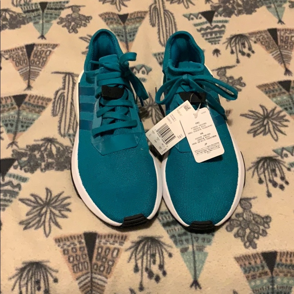 Men’s adidas shoes.